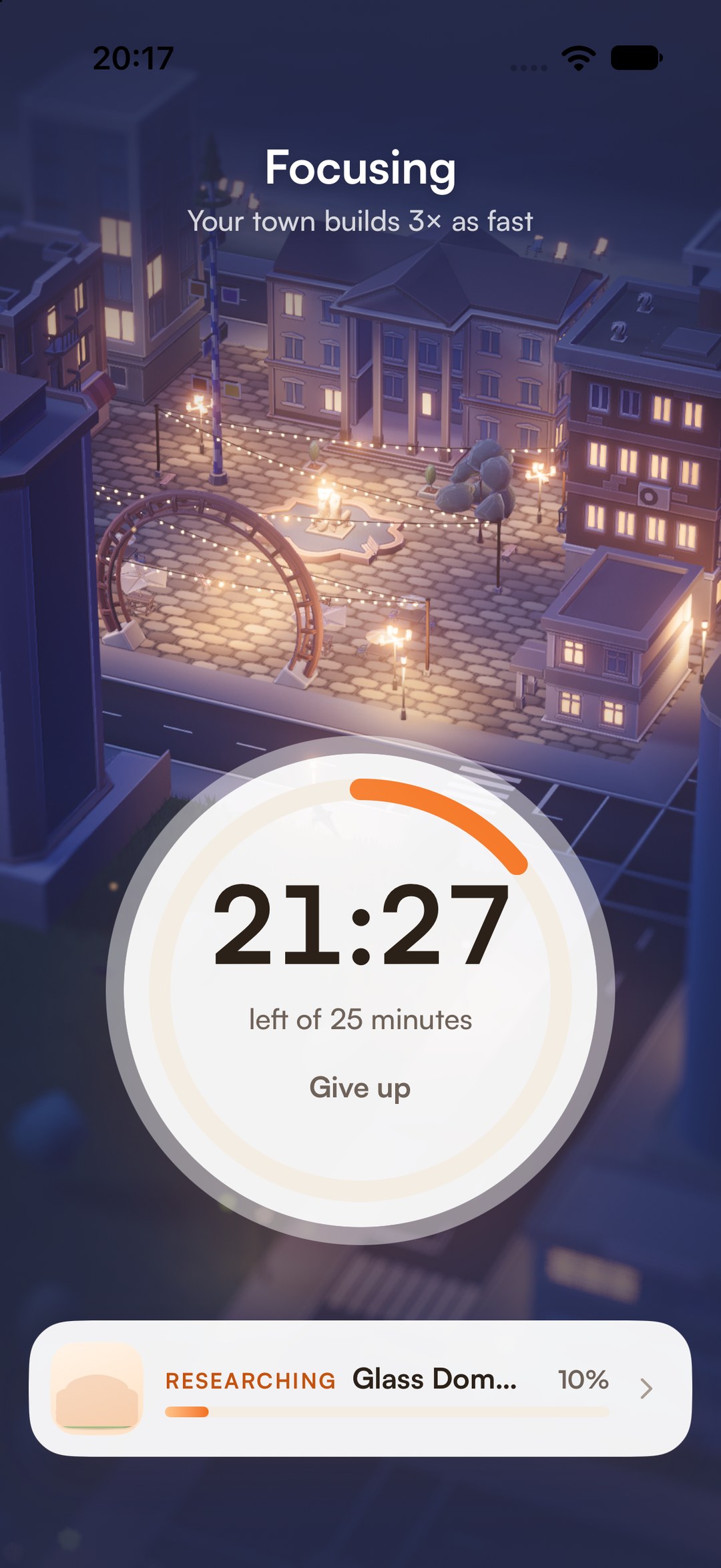 A focus session at night: 21:27 left, the town lit up behind the timer